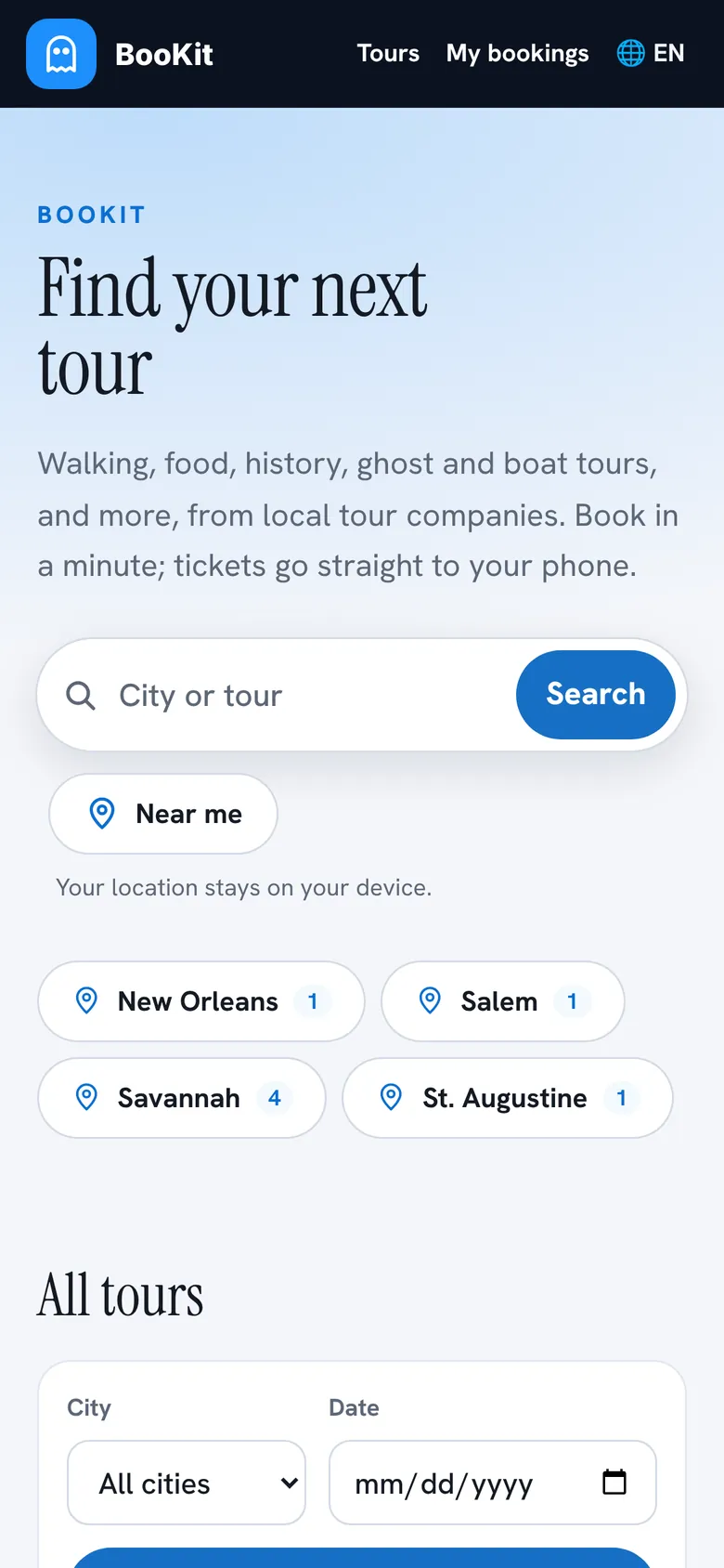 The bookit.tours home page on a phone: a search box, Near me, and cities to choose